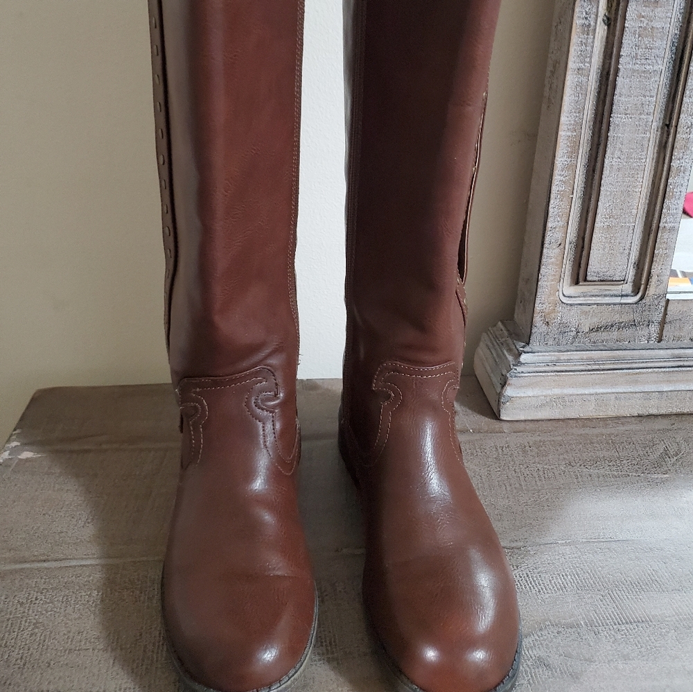 Brown knee boots.